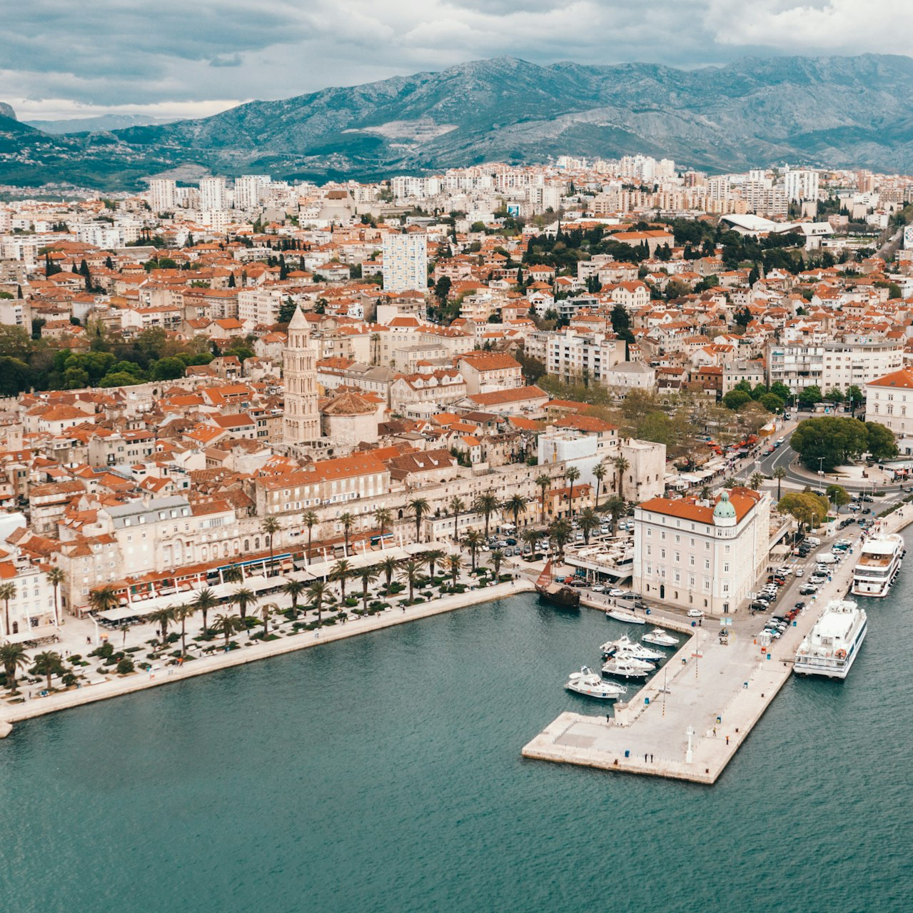 aerial view of building near body of water